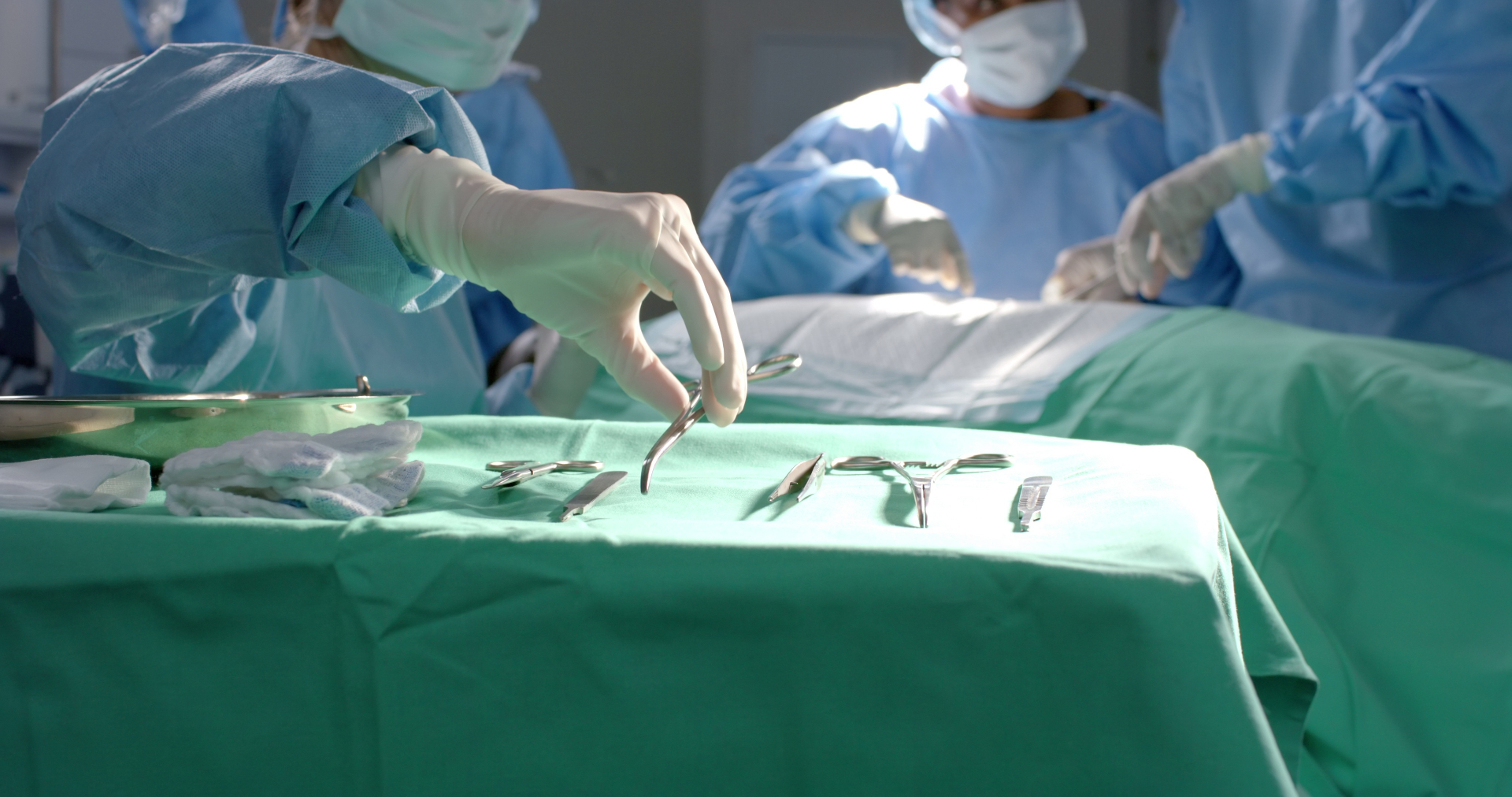 Surgical team preparing instruments — illustrating the pre-operative planning required for patients on GLP-1 medications